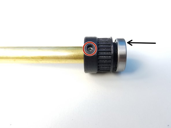 Insert 6701 Bearing on the Small 3/8' Pulley Gear and align the set screw hole to the other end of the Ulna Gearbox Shaft (3/8' Brass Tube)