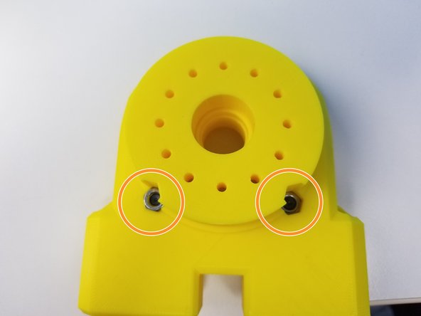 Insert the other two M5 Hex Nuts on the bottom inserts