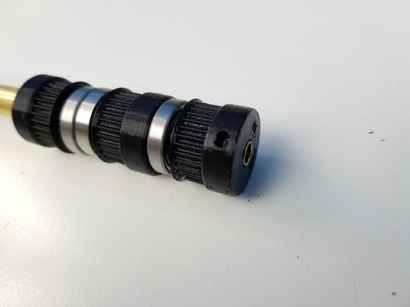 Make sure to put the 6701 Bearings on the Pulleys before inserting the gears to the Tube