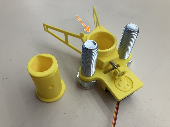 ...onto the main body so they fit together.  The hole on the main body matches the bump on the one-way ring.  There should be no gap between the parts.