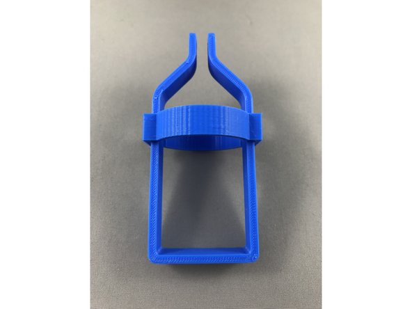 slide the weight securing clip (Green) onto the weight holder (Red)