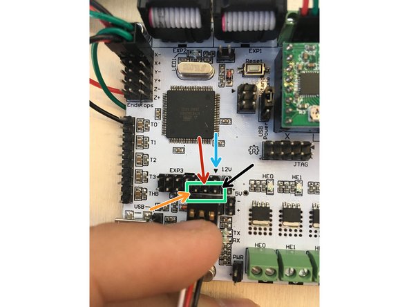 Plug the servo wire onto the board on the bottom row of the EXP3 block.