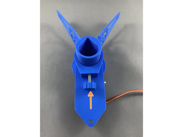 Slide servo piece together with pen securing screw onto the pen holder. Tighten up the screw afterwards.