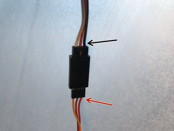 Connect the white/red/black servo extension cable coming from RUMBA board EXP3 pins 2/4/6 to the servo connector.