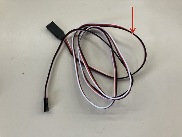 On the left hand side of the robot there are two cables: from the limit switch (3 wires)...