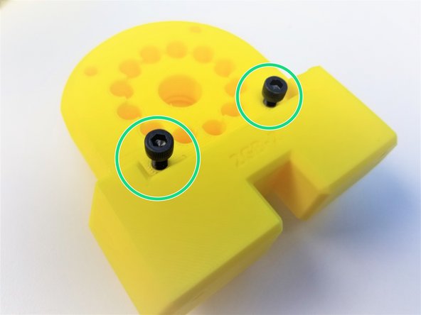 [Opt.] if the nuts are too loose in the insert, use M5x20mm Screws (or any M5 screws) to hold it in place during assembly