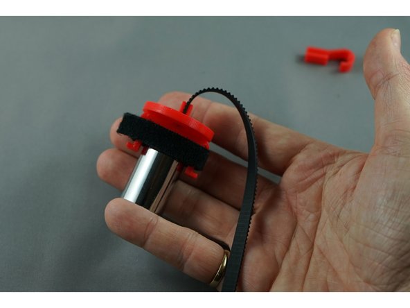 Then wrap the velcro around the Y clip to secure the weight in place.