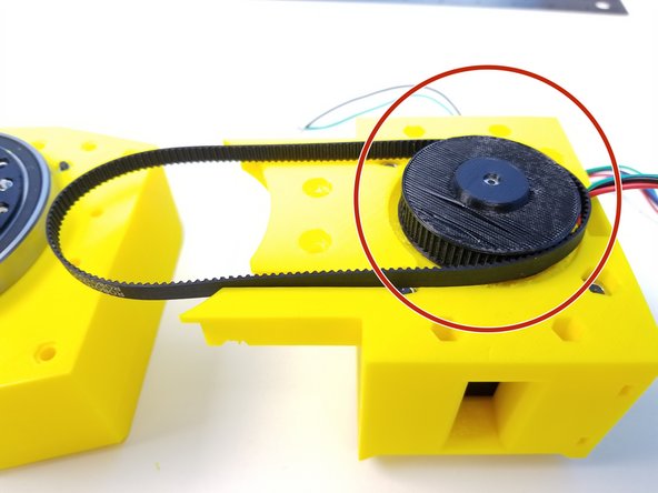 Loop the Timing Belt around the Input Pulley (motor side)