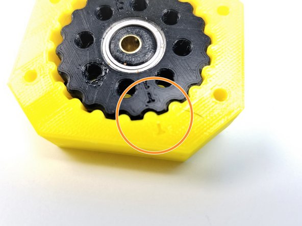Align the Side Sharpie mark on the Top Rotor to the &quot;T&quot; labelled on the Housing and slide the rest of the Rotor in.