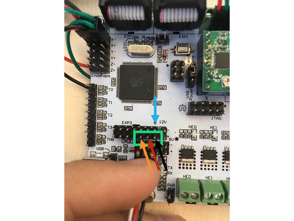 Plug the servo wire onto the board on the bottom row of the EXP3 block.