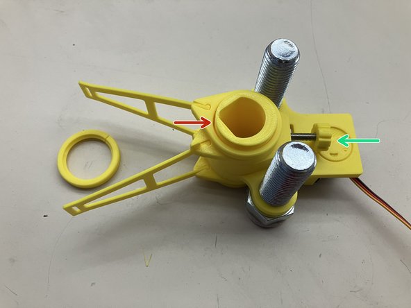 Arrange the collet with the wide part on the bottom.  Lift the rest of the assembly as one and lower it on to the collet.