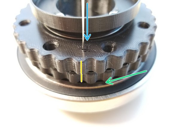While keeping the Eccentric Shaft and Top Rotor in a fixed position, rotate the Bottom Rotor to a point where you can see the Bottom Alignment Hole