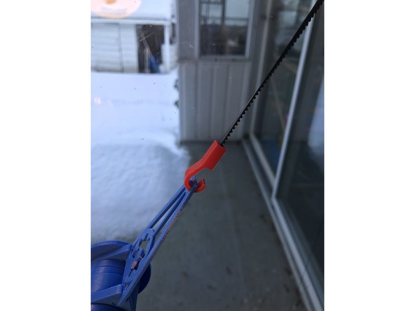 Connect weights to pen holder arms using provided hooks.