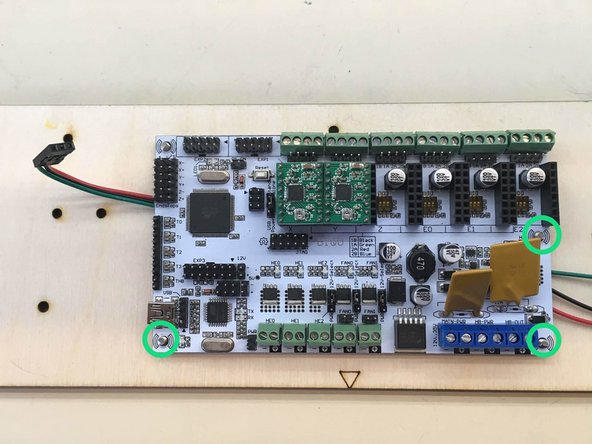 Place wires from right hand limit switch in between the screws for holding the board.