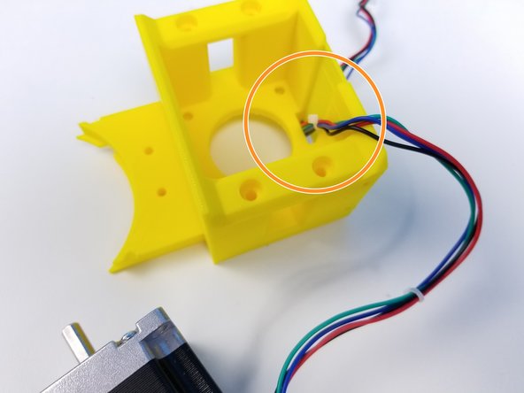 Insert the NEMA 23 Motor to the Motor Holder along with its Cable