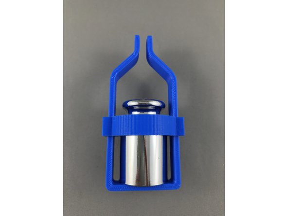 Insert 200g weight provided in the box