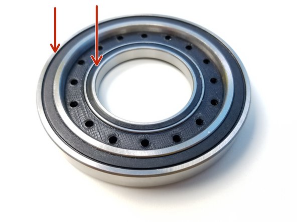 Insert 6813 Bearing and 6708 Bearing in  the Nut Insert Half of the Bottom Output Disk