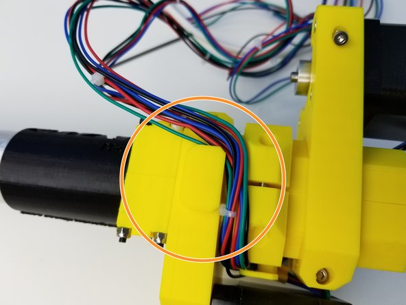 Looking from the bottom all Three Motor Cables should catch the extrusion of Motor 3 Mount piece.