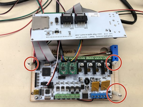 Insert three M3x35 screws and put one 25mm spacer on each.