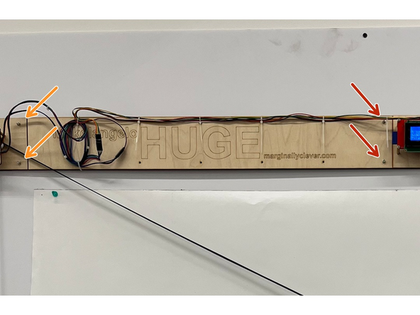 Using an M3 alan key (hex key), undo the screws that hold the left and right sides together.  A Torx T10 or an imperial 1/8 will also work.