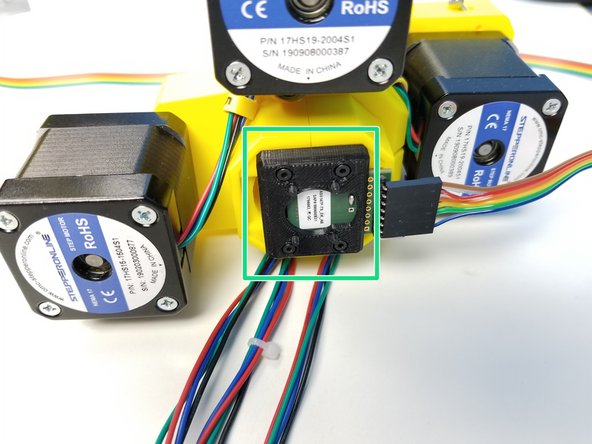 Partially screw in the M2x6mm Screws to the Sensor Mount