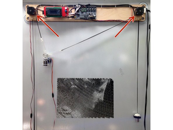 Install one belt on each of the two pulleys.
