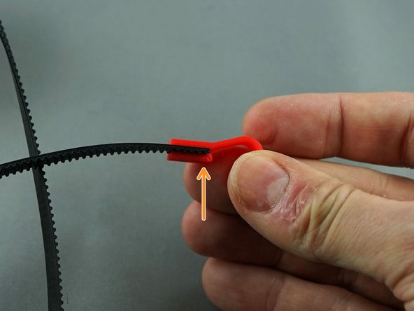 Make sure the last tooth of the belt is in the last tooth of the hook.