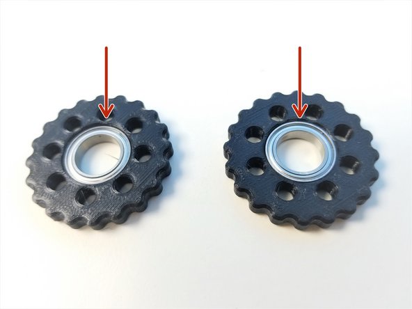 Insert 6701 Bearings to both Top and Bottom Rotors as well as the Top Housing