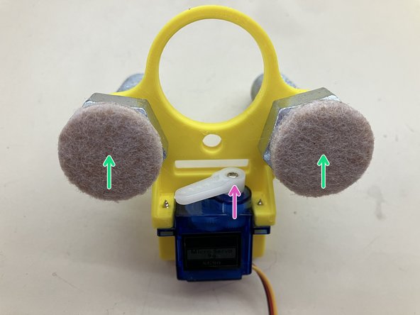 Screw the M16x50 bolts into the main body.  Try to orient the flat sides of the heads as shown.  It is a very snug fit.  It may require pliers or an adjustable wrench.