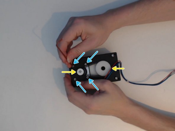 Gently feed the stepper motor wire through the hole in the core.