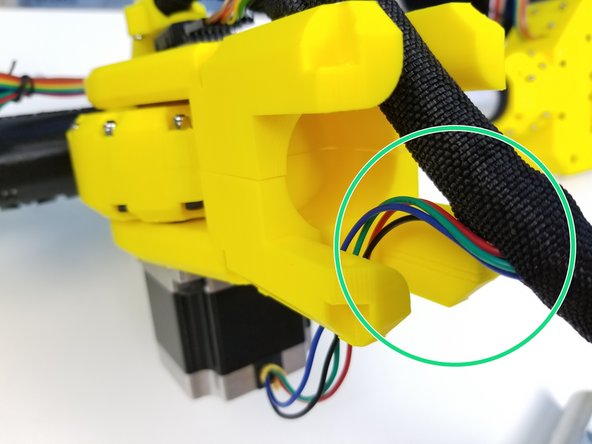 Insert the Elbow Motor Cable into the Braided Cable Sleeve as well