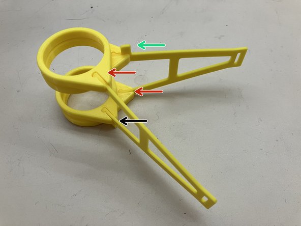 Press one stabilizing ring onto each each hand of the arm.  They should be a snug fit.