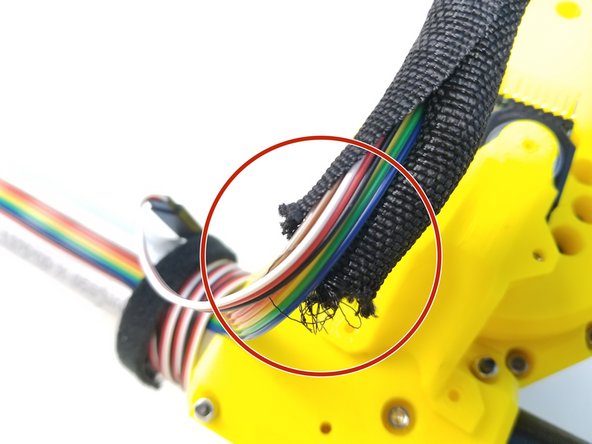 Insert all the Cables on the Forearm to the Braided Cable Sleeve at the top of the Elbow Sensor Holder