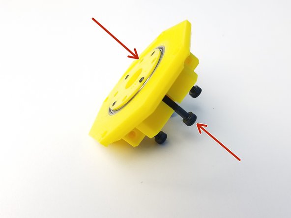 Place the Middle Output Disk on the other side of the Top Output Housing