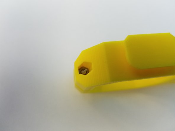 Insert M3 Square Nut and secure it using M3x16mm Screw. Don't screw it all the way yet.