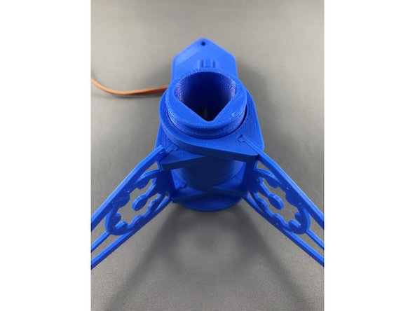 Slide in other two arm fittings onto pen holder and connect with aligned arms.