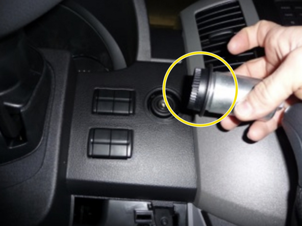 Using the EIS tool, unscrew the retaining ring for the ignition cylinder and set aside