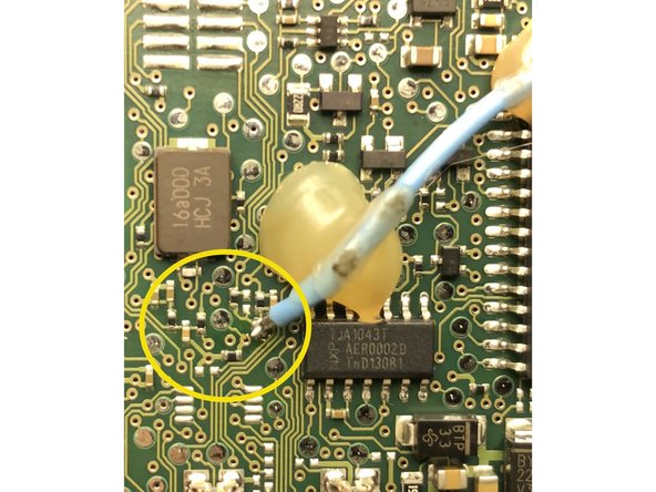 Included with the kit is a short blue wire with a black plug. The bare end of that wire will be soldered to the board of the EIS