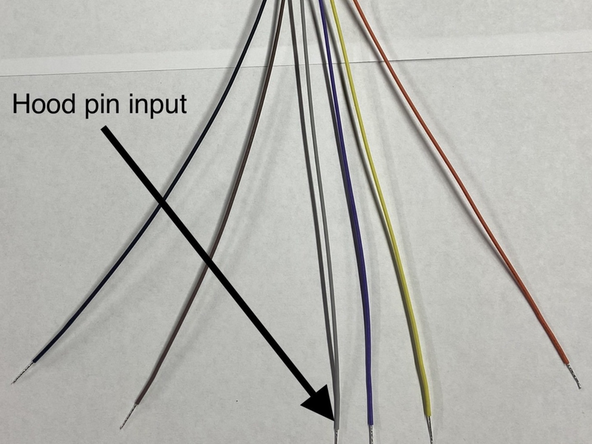 Run wire from hood pin securely through firewall and run to driver side under dash area