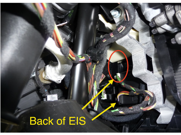 Disconnect 6-pin white plug (upper) from EIS