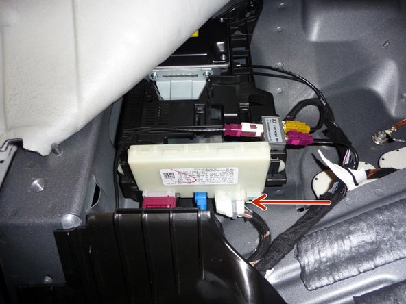 Un-plug the main connector from the KeylessGo module.