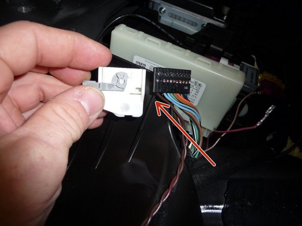 Re-install the shroud for the KeylessGo main plug and plug it back in.