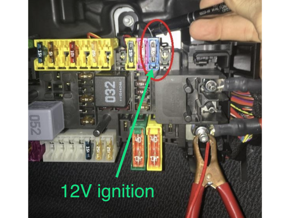 Connect green ignition wire from alarm from alarm brain to 12V ignition source at fuse box