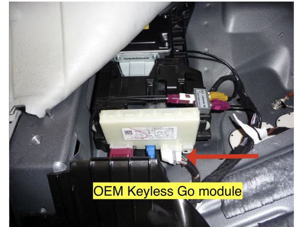 Locate twisted pair of brown and brown/red wires at the Keyless Go module. Unlatch and unplug connector. Remove connector shroud.
