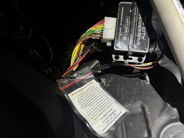 The SKSNG907, SKSNG907G, or SKSNG907RV or SKSNG907G is connected using T-harnessing in the driver side under dash area