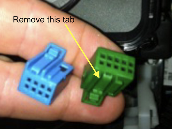 There is a small keying tab on the top of the connector. Using a small cutting tool, carefully cut off the keying tab flush with the shell of the connector. See pictures.