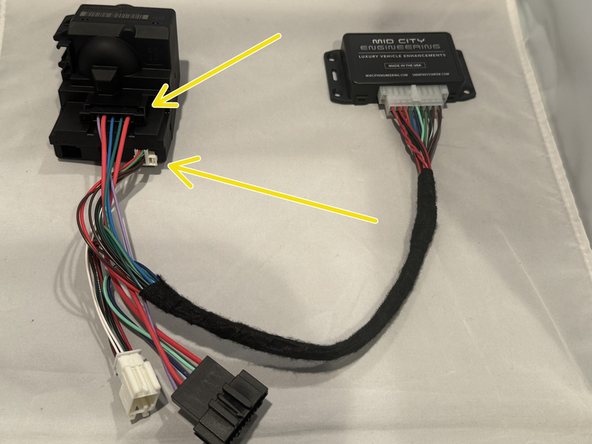 Connect female 5-pin plug from T-harness into rear of EIS