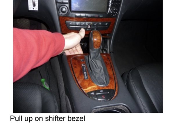 Open the ashtray in front of the shifter.