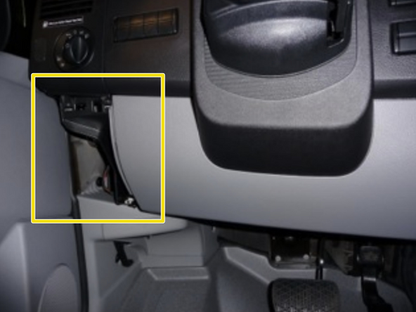 Pull the smaller left panel to release the upper clips and carefully set panel aside