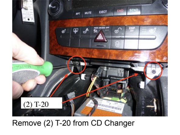 Remove the CD changer and set it aside.